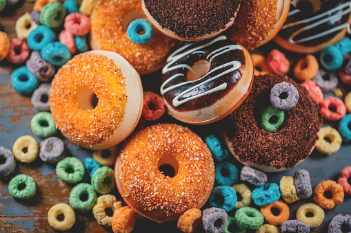 Donut For Breakfast On Wood Board