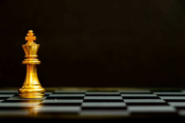 istock Gold king chess piece stand on black background with copy space (Concept for leadership, unique) 1349426394