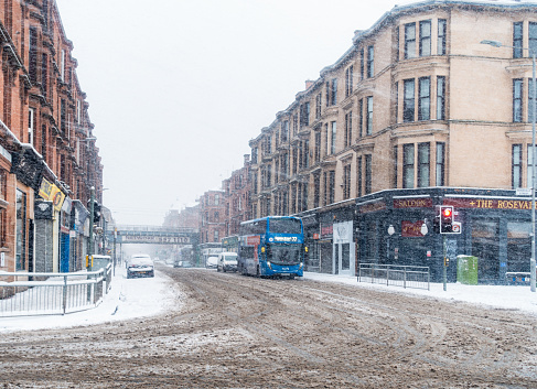 Snow falling during freezing, windy weather in Partick, to the west of Glasgow's city centre.