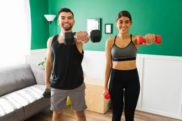 istock Attractive woman and young man training 1349431884