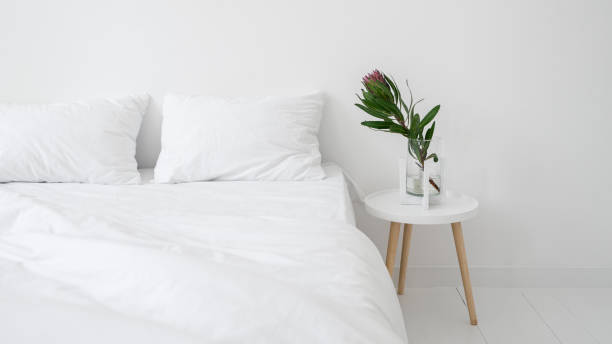 istock White minimalist bedroom with modern interior design 1349433469
