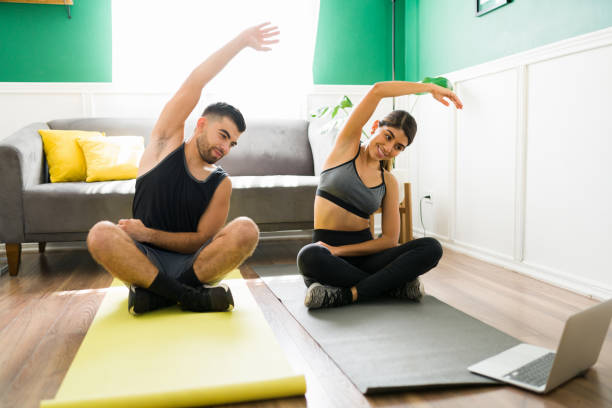 istock Excited boyfriend and girlfriend exercising 1349433502