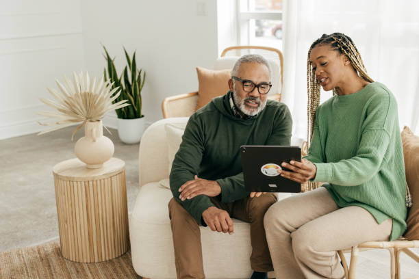 Helping with tax planning Tax lawyer and senior men during the business meeting estate planning lawyer stock pictures, royalty-free photos & images