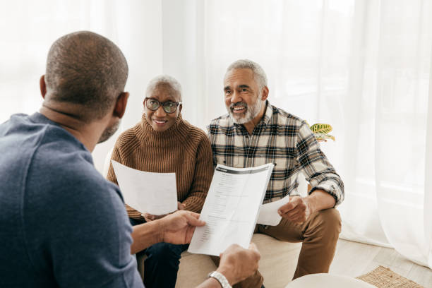 istock Home consultation for senior couple 1349437347