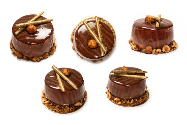istock Chocolate and caramel cake isolated on a white background. 1349438606