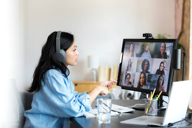 istock Freelancer uses desktop PC at home to attend meeting 1349443318