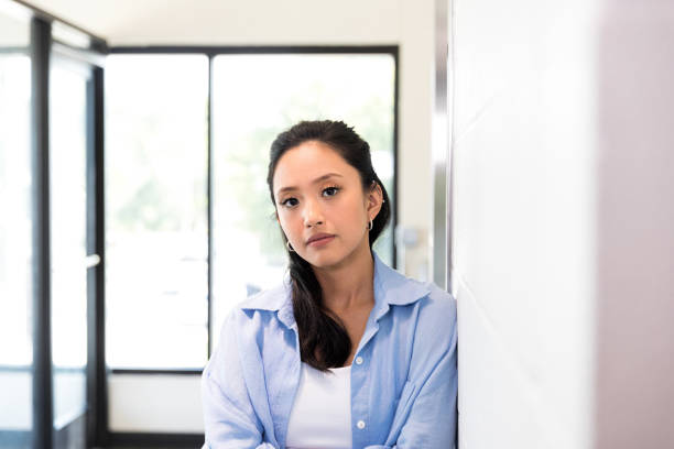 istock College student with cool attitude poses for photo 1349443360