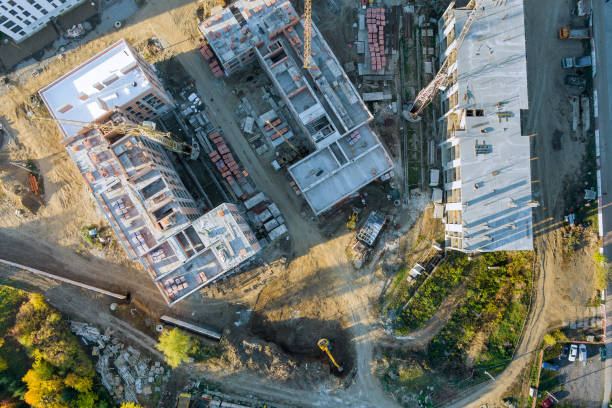 istock Construction of a high rise building with a crane 1349446469