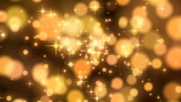 Abstract background with shining golden particles and stars
