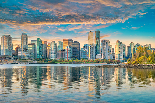 Skyline of downtown Vancouver, Coal Harbour, British Columbia, Canada at sunrise.