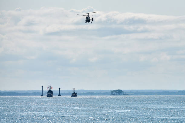 istock Battleships war ships corvette during naval exercises and helicopter maneuvering over sea, warships 1349454488
