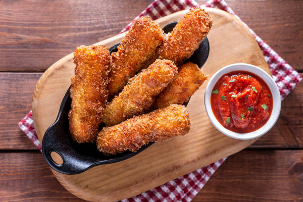 Mozzarella Sticks Fresh Mozzarella Sticks with Marinara Sauce Mozzarella Sticks stock pictures, royalty-free photos & images