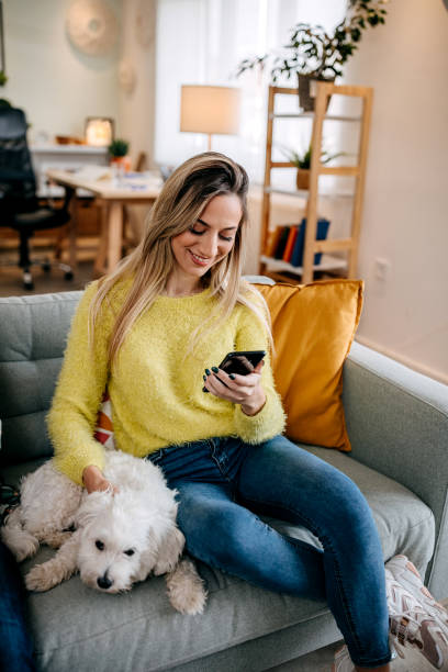 istock Young woman uses the phone 1349462878