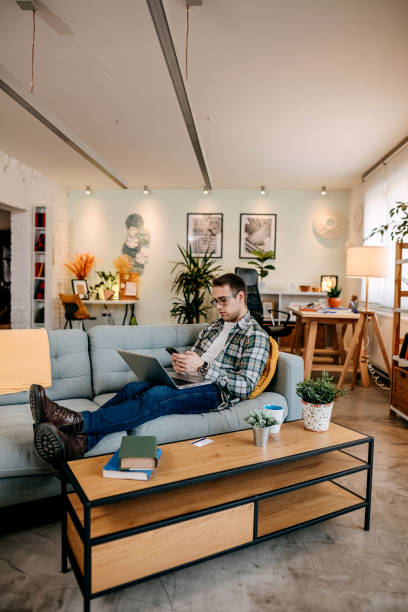 istock Handsome businessman at home 1349463803