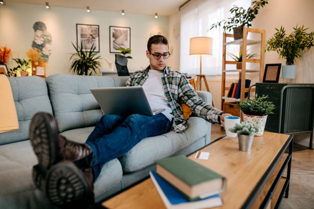 istock Handsome businessman at home 1349463841