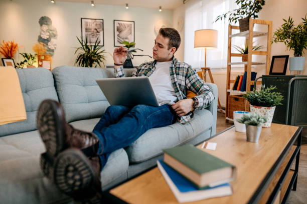 istock Handsome businessman at home 1349463847