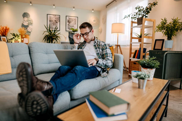 istock Handsome businessman at home 1349464017