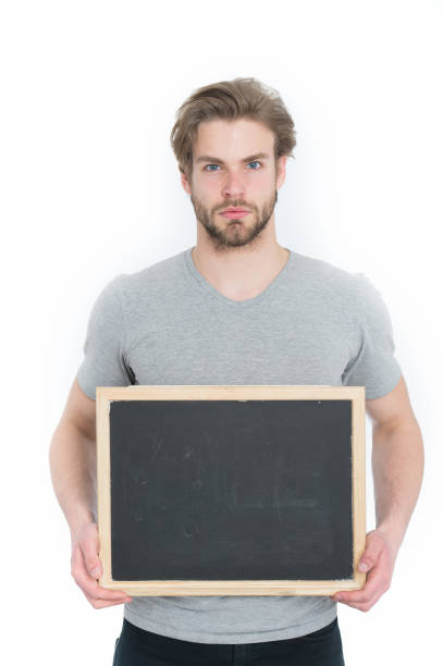 istock empty blackboard in hand of man or businessman 1349464043