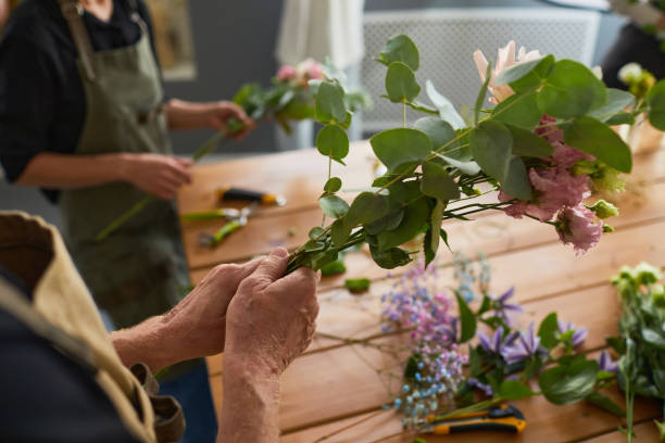 Florists Arranging Flowers Close Up
