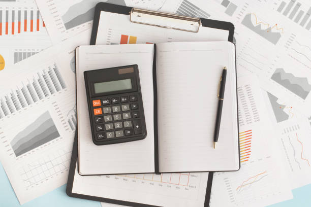 istock Business graphs, charts and calculator on table. Financial development, Banking Account, Statistics 1349472131