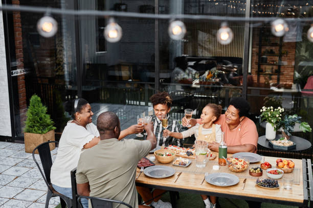 istock Family Celebrating Outdoors 1349472257