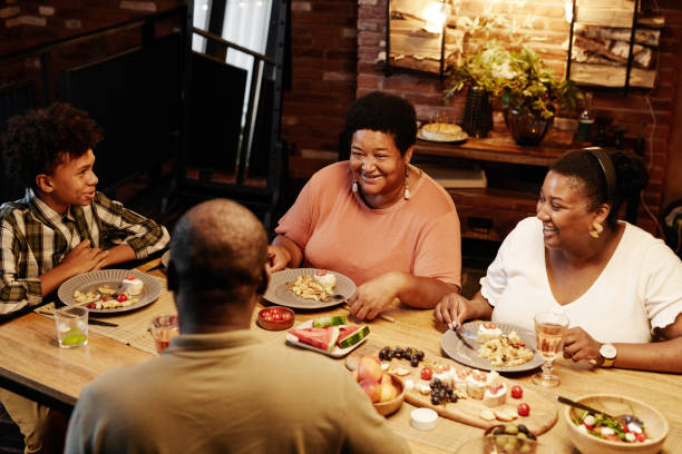 istock Smiling Grandmother at Family Dinner 1349472271