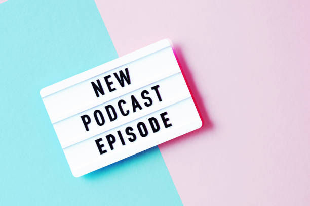 istock New Podcast Episode Written White Lightbox Sitting On Pink And Blue Background 1349474571