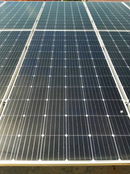 istock large solar panels neatly mounted on top of the building under the sun's pull 1349478614