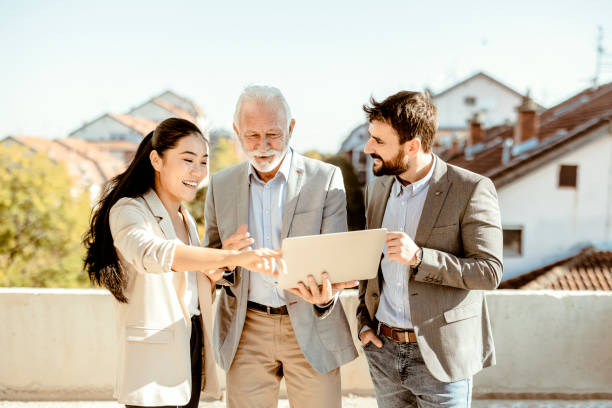 istock Couple Meeting Real-estate Agent 1349482867