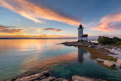Annisquam Harbor Light Station is a historic lighthouse on Wigwam Point in the Annisquam neighborhood of Gloucester, Massachusetts.