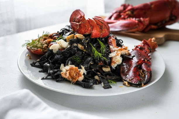 istock Delicious gourmet black pasta with lobsters 1349483258
