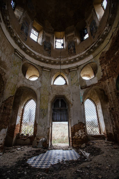 istock Inside the old ruined red brick church in gothic style 1349484308