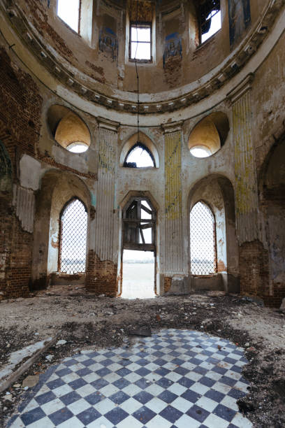istock Inside the old ruined red brick church in gothic style 1349484322