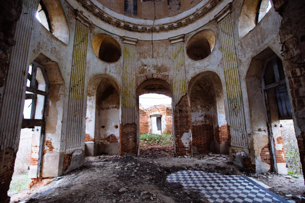 istock Inside the old ruined red brick church in gothic style 1349484486