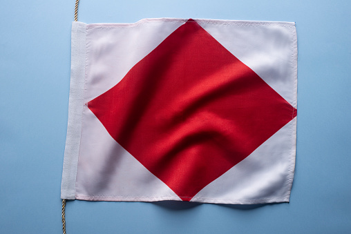Nautical signal flag, meaning A.