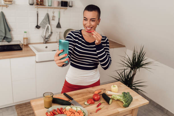 istock Woman taking photos with food 1349487963