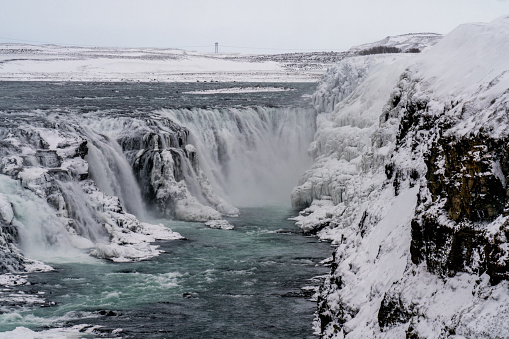 Panoramic summer view of popular tourist destination - Gullfoss waterfall. Incredible winter scene of Iceland, Europe. Traveling concept background
