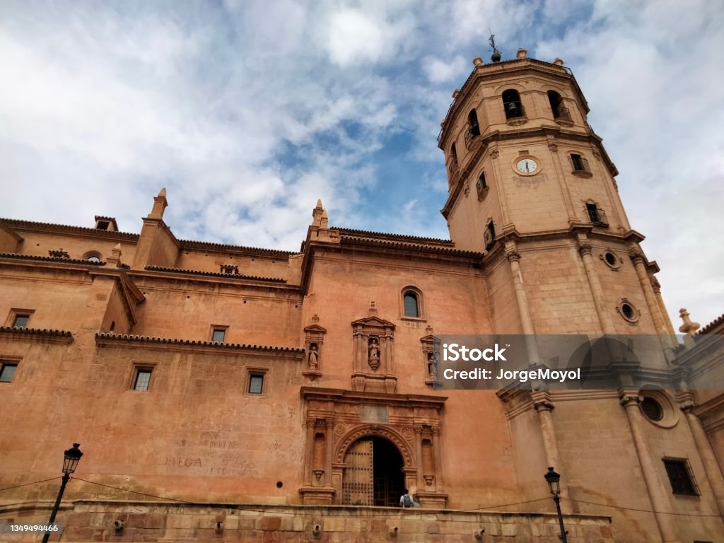 Church of San Patricio in Lorca, Murcia South façade of the church of San Patricio with tower and bell tower, XVI-XVIII centuries, in the Plaza de España de Lorca, Murcia, Spain. Art Stock Photo