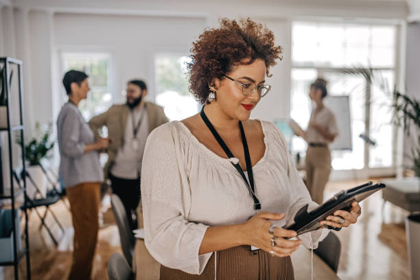 istock Happy businesswoman using digital tablet at office 1349496015
