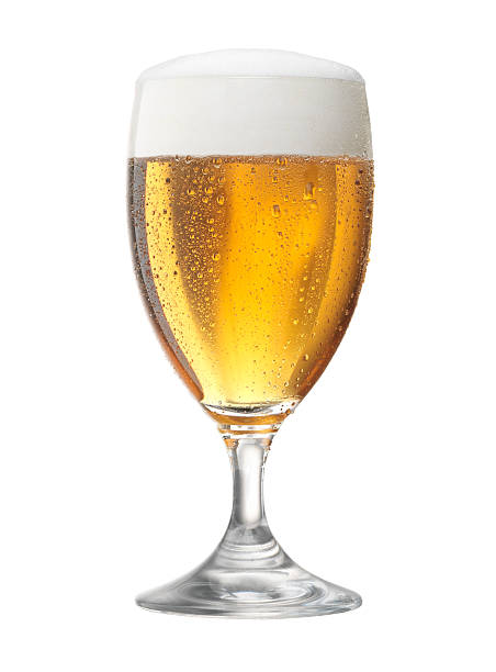 Glass of  beer Fresh glass of pils beer with froth and condensed water pearls beer alcohol stock pictures, royalty-free photos & images