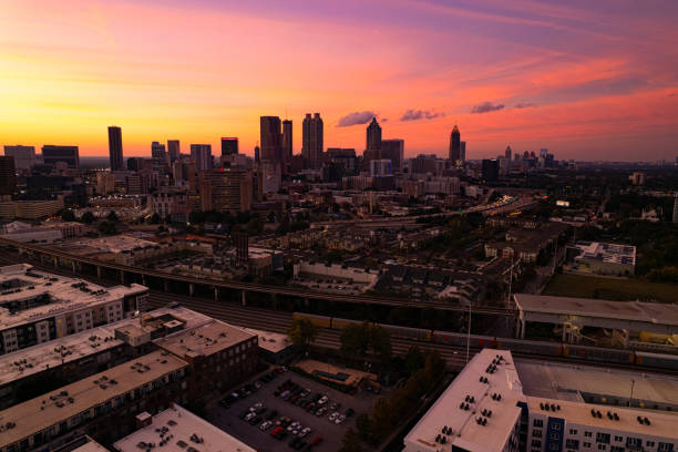 istock warm light from the sun setting illuminates the city 1349506615