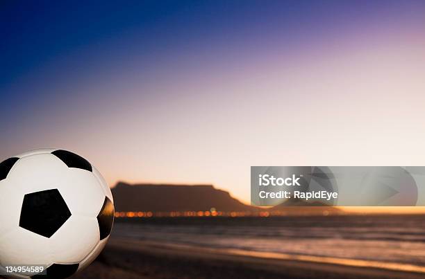 Championship Soccer Ball At Dusk With Table Mountain In Background Stock Photo - Download Image Now