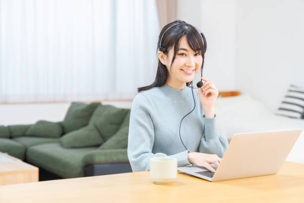 istock young asian woman studying with a laptop computer,correspondence course 1349550641
