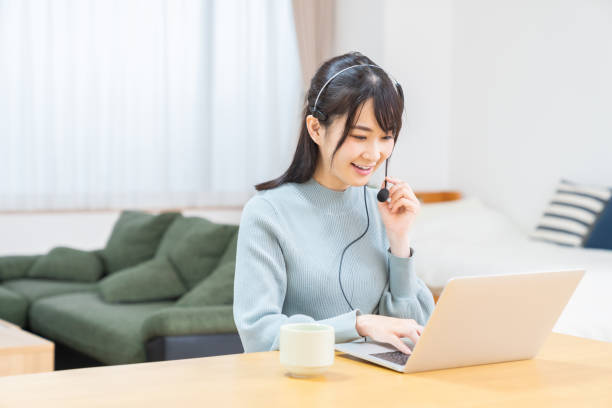 istock young asian woman studying with a laptop computer,correspondence course 1349551198