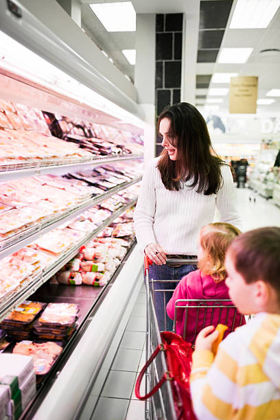 istock Mom and kids shopping 134955125