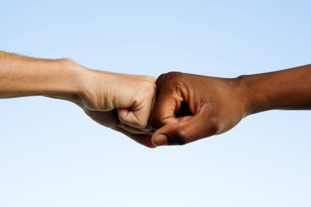 istock Black and white fists 134955130