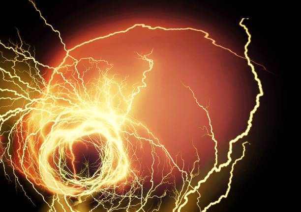 istock Abstract background swirling with golden flashes 1349552258