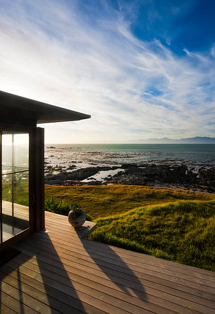 istock Cloudy sky and sea from deck of luxury beach house 134955971