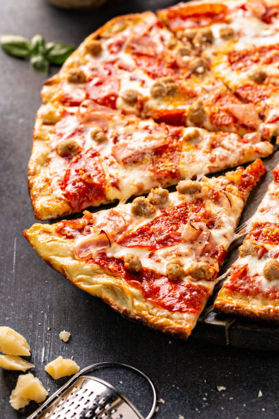 Meat lover pizza with pepperoni, ham and sausage