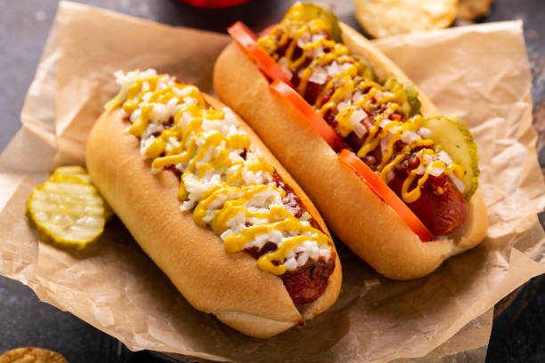 istock Two hot dogs with ketchup and mustard 1349560418